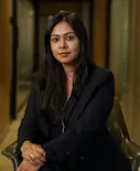 View Tanu  Banerjee Biography on their website